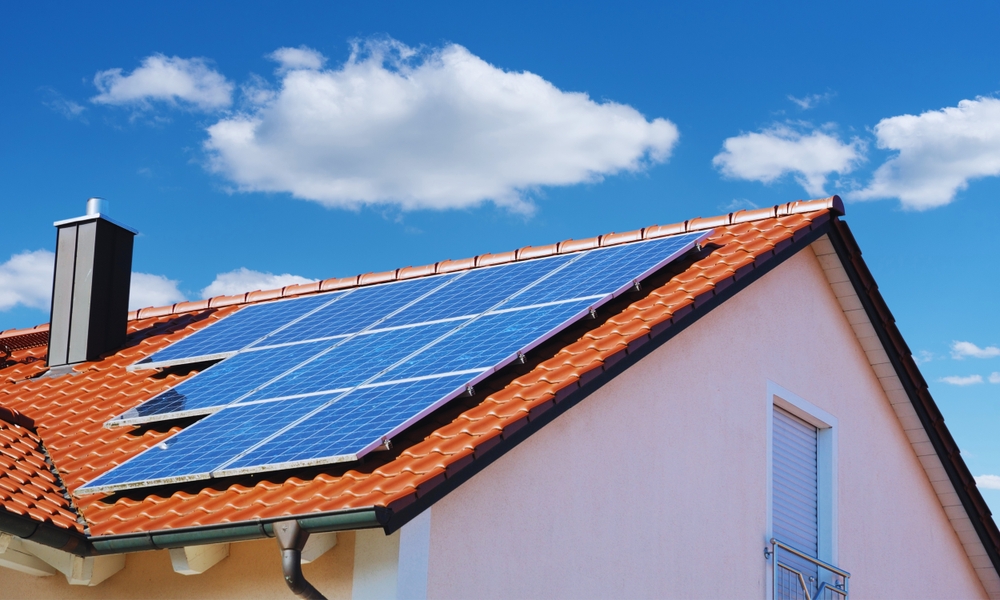 Red,Tile,Roof,With,Solar,Panels